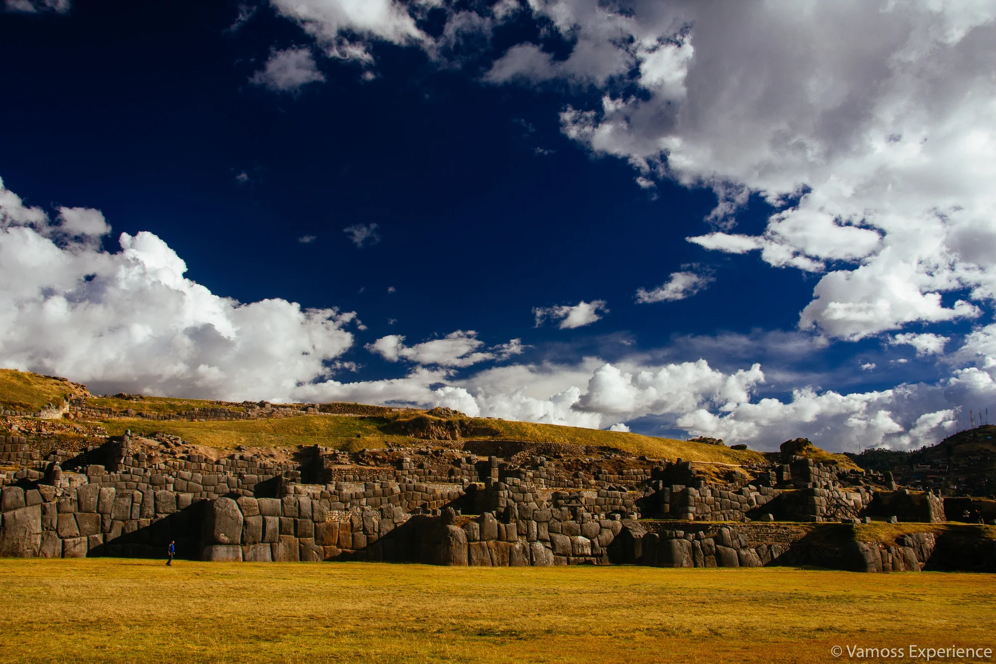 Inca stonework under a wide sky